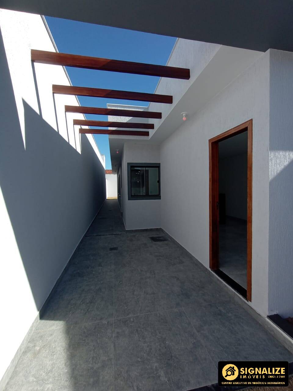 Casa à venda com 3 quartos, 76m² - Foto 2